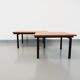 Suite of two vintage modernist Isa coffee tables in teak and black metal from the 60s