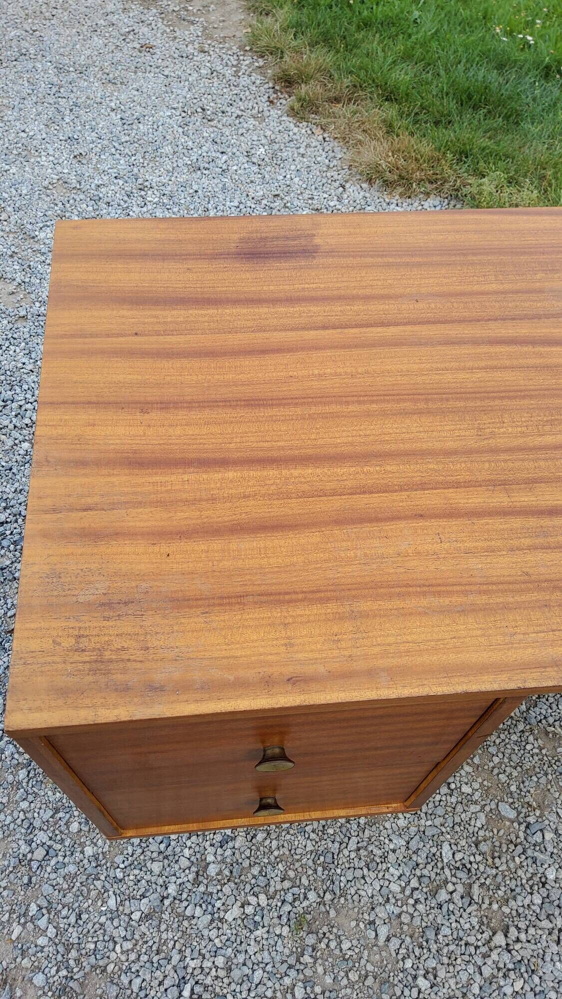 60s desk in golden blond mahogany with conical coffered feet