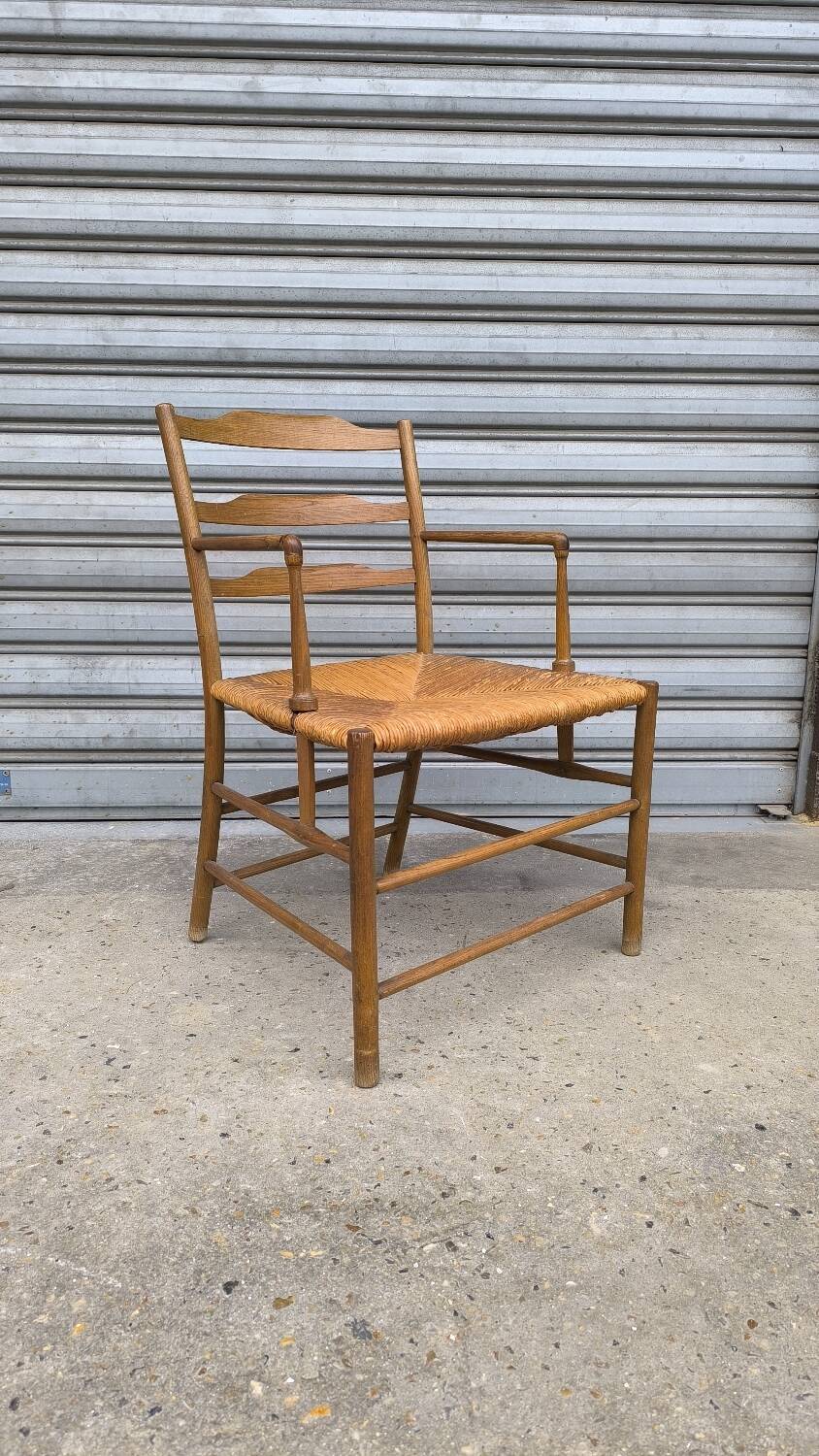 Early 19th century stepped back armchair