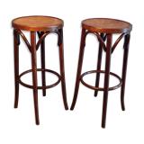 2 curved wooden bar stools