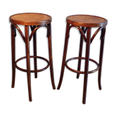 2 curved wooden bar stools