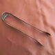 Art deco sugar tongs in silver metal