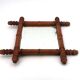 Small wall mirror in turned wood in a faux bamboo style, 1930s.