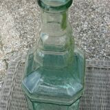 Square bottle of molded-pressed glass with faucet