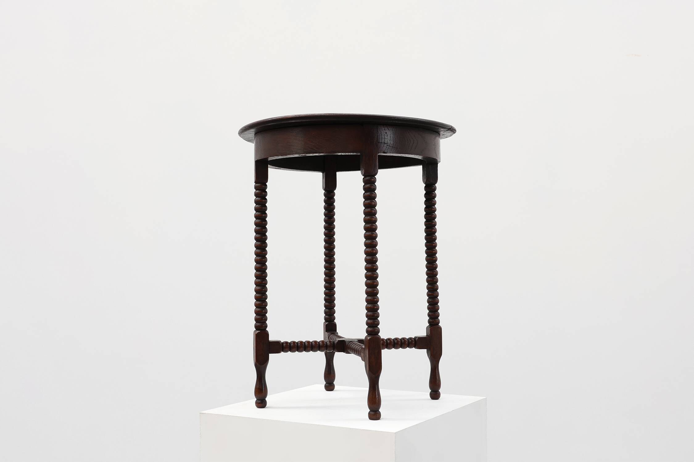 Art Deco round wooden side table with spindle legs, France circa 1900