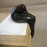 Bronze art deco press papers