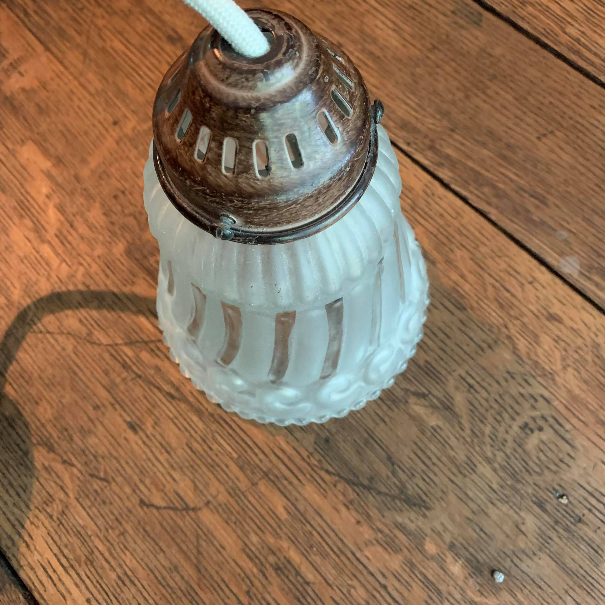 Frosted pressed molded glass suspension