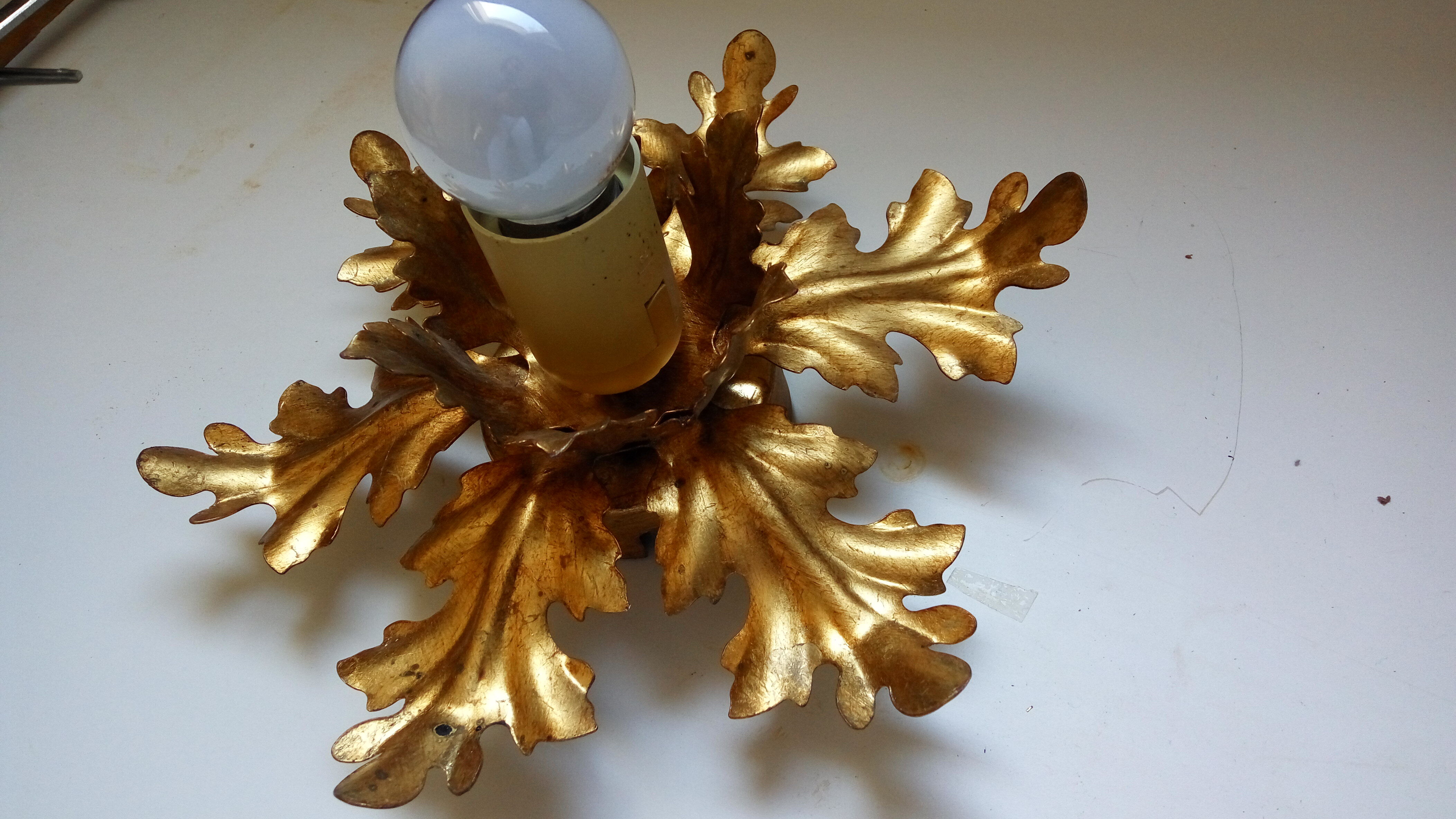 Golden metal wall light