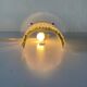 Simple arch-shaped wall light in textured glass, 1950s, Germany.