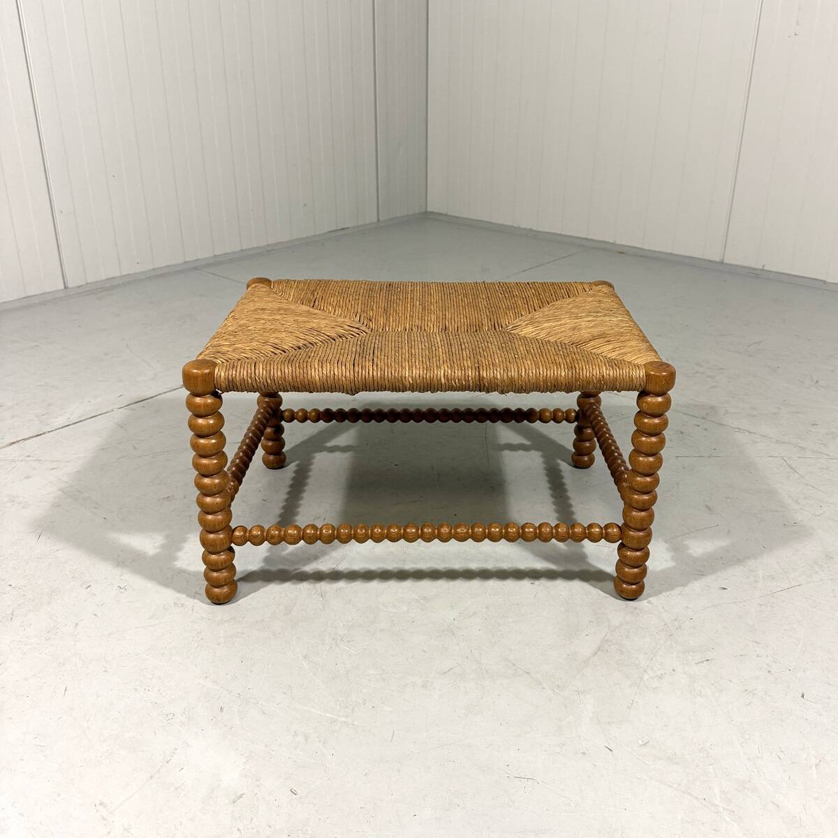 Low oak bobbin stool with rush seat 1930’s