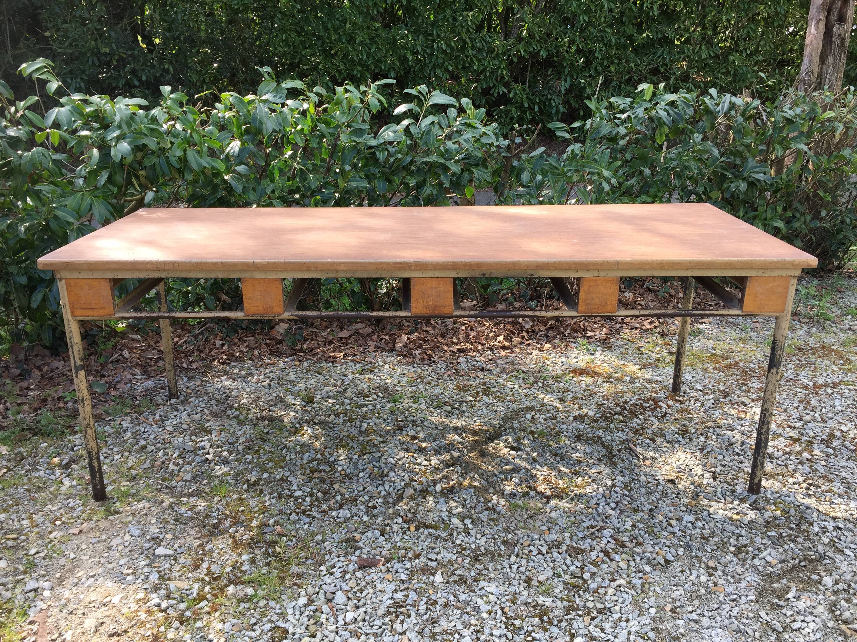 Vintage modernist table with metal tubular base