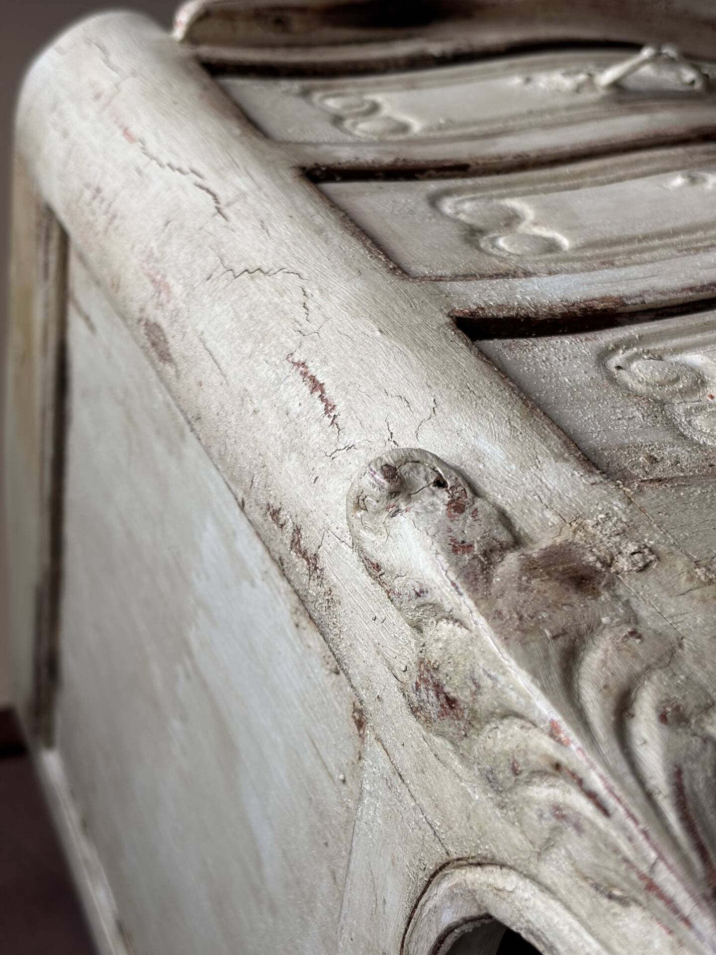 A pair of distressed bedside tables.