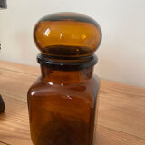 Old apothecary bottle in brown glass / jar