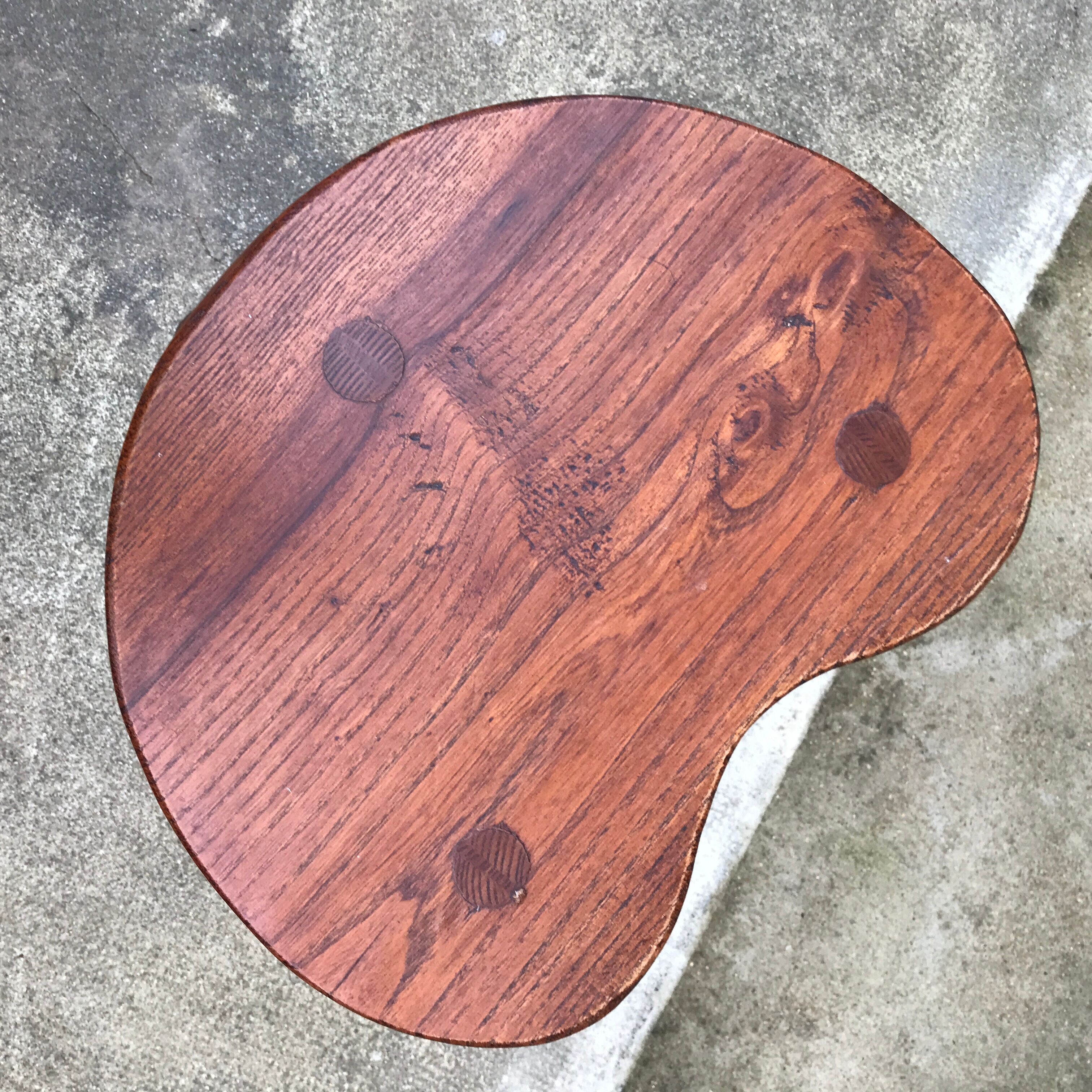 Brutalist tripod standing farm stool