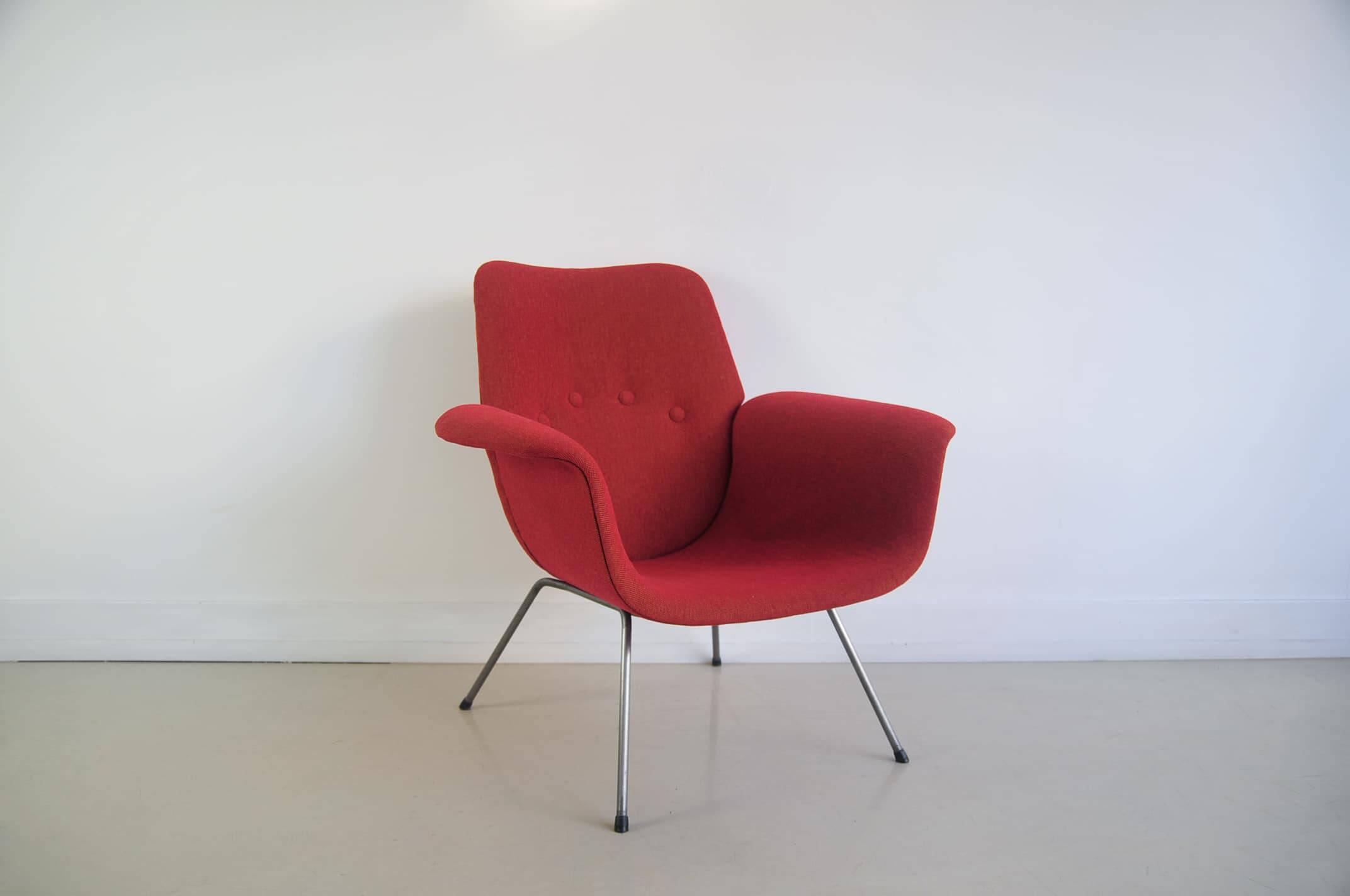 Red armchair with metal legs