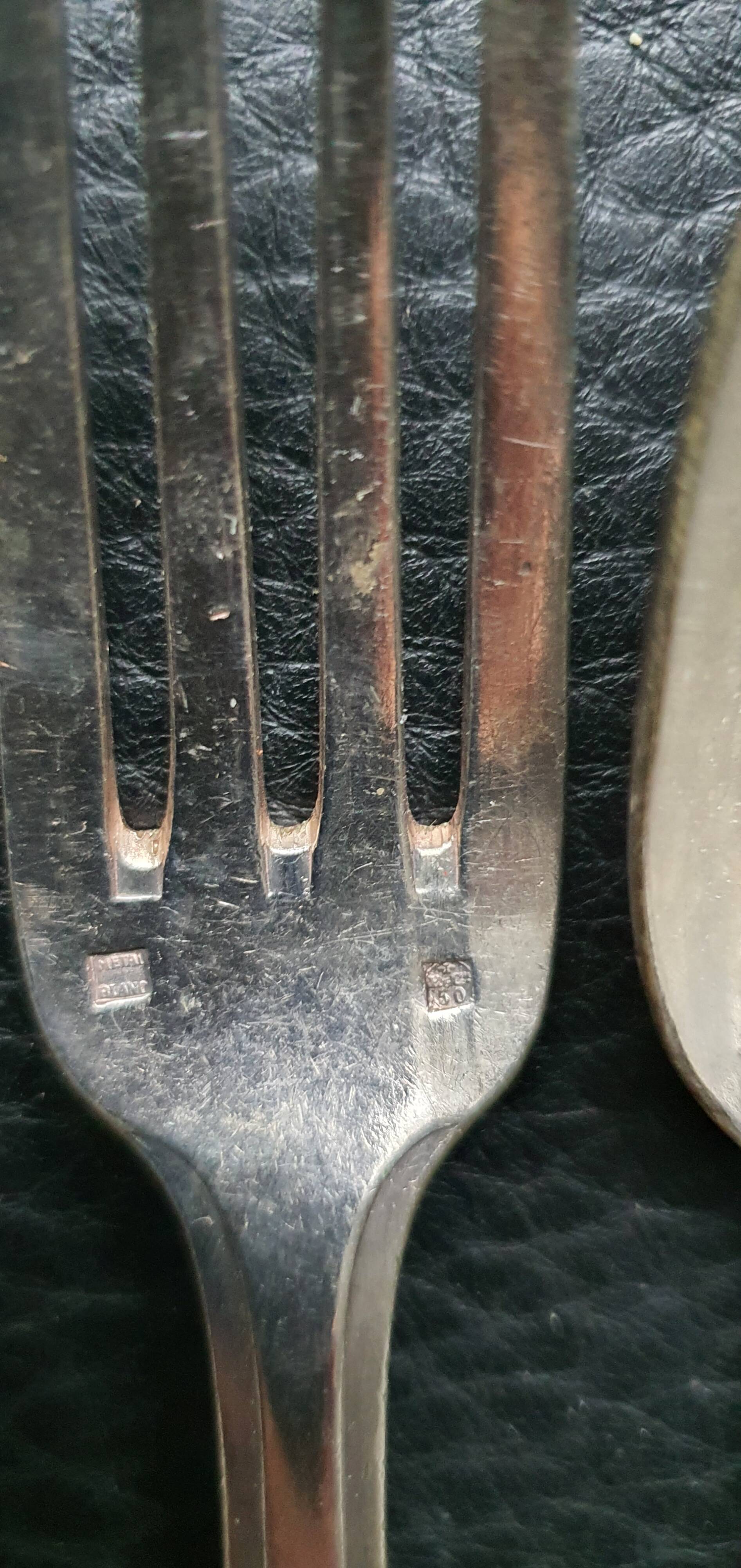 Ensemble 2 cuillers et 2 fourchettes en argent