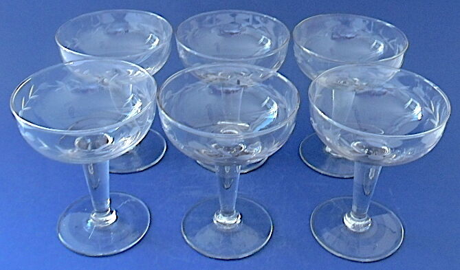 Suite of six glasses of champagne in colourless ground glass