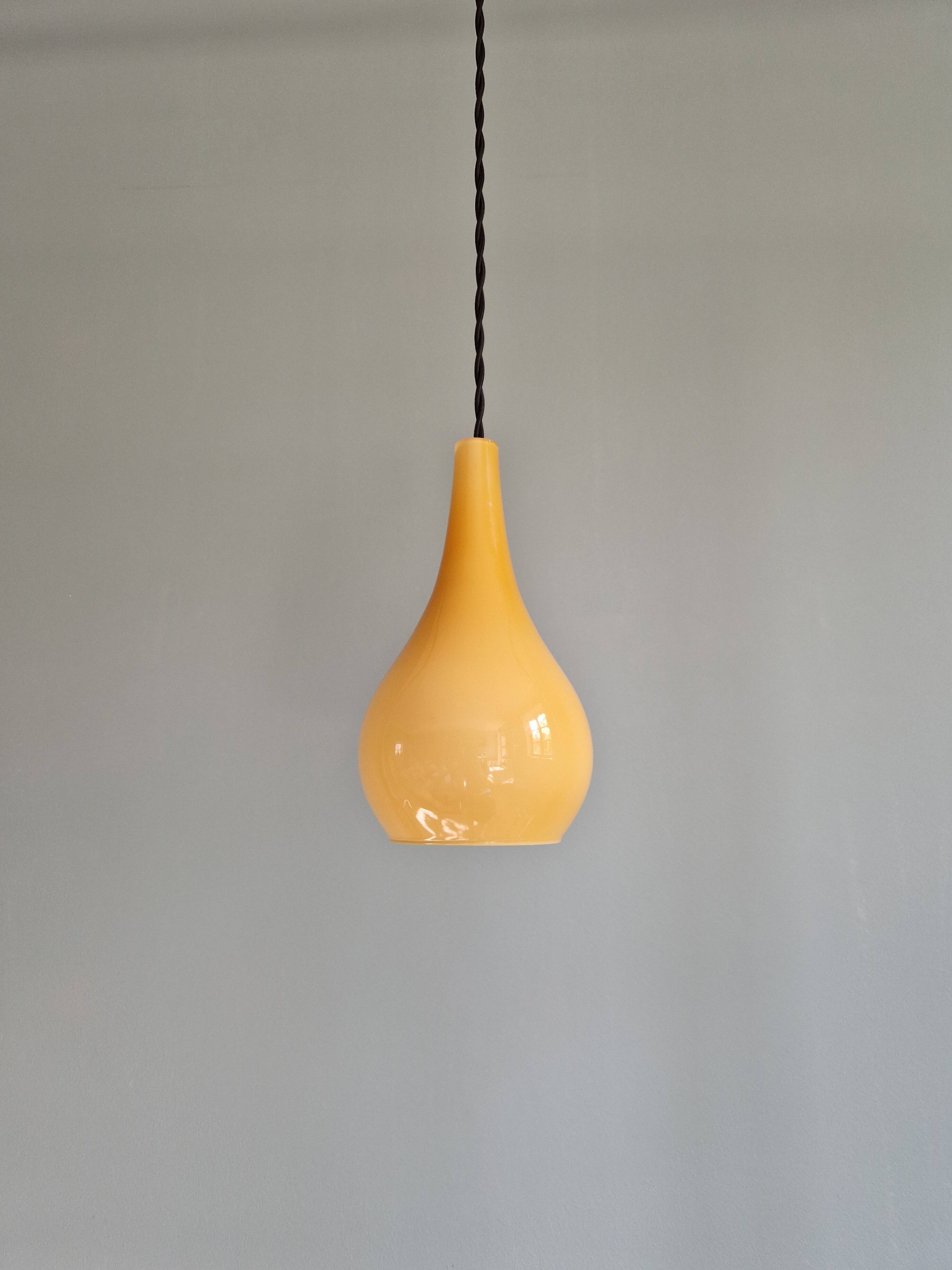 Scandinavian pendant light in honey-colored opaline glass, 1960s