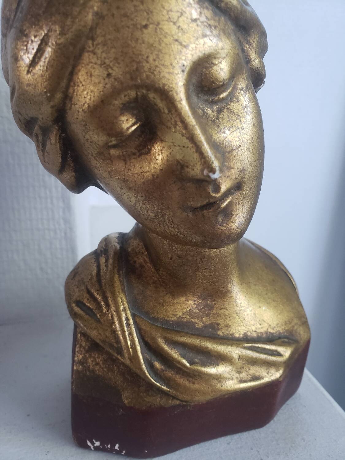 Gilded plaster bust