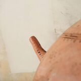 Antique oriental clay pitcher.