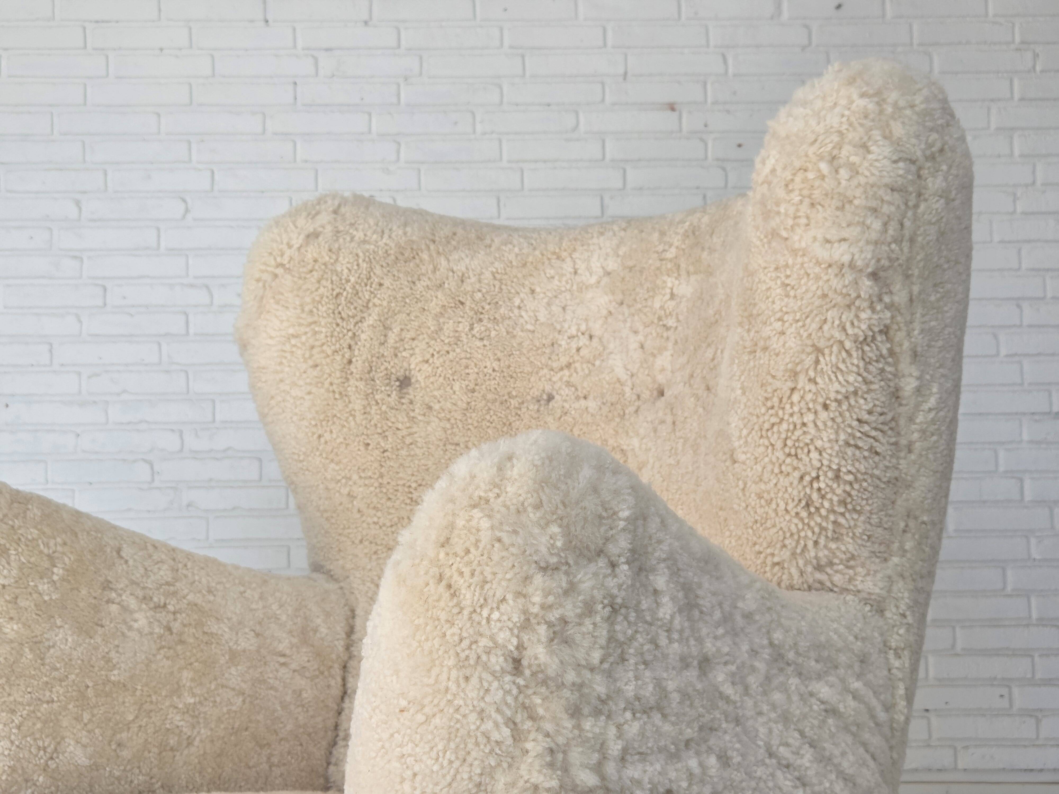 1960s, Danish armchair, genuine sheepskin "Canberra", reupholstered.