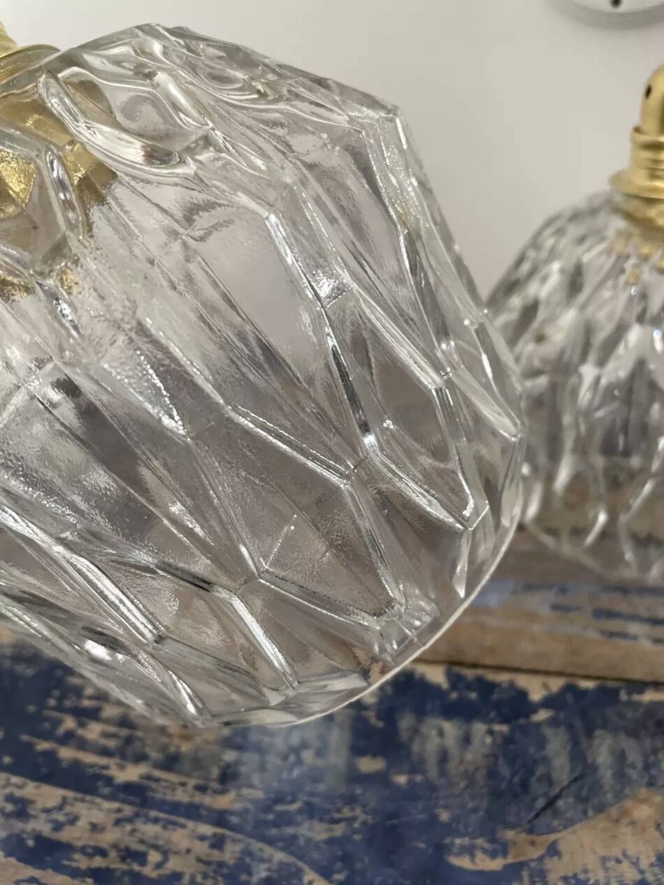 Pair of chiseled glass wall sconces