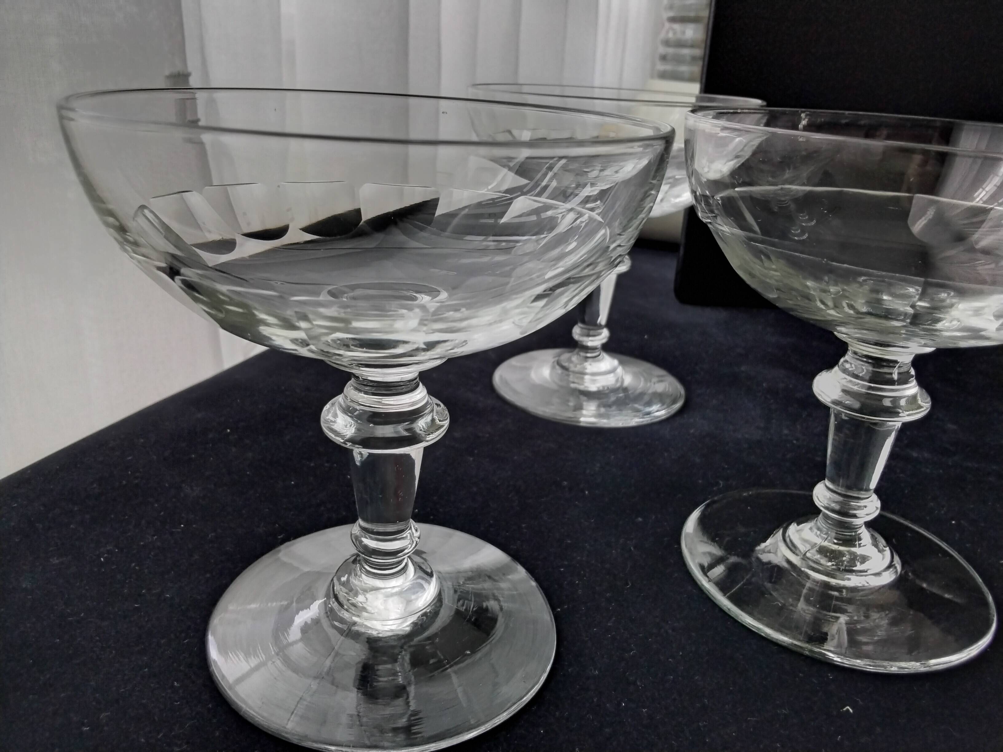 8 old glass champagne glasses