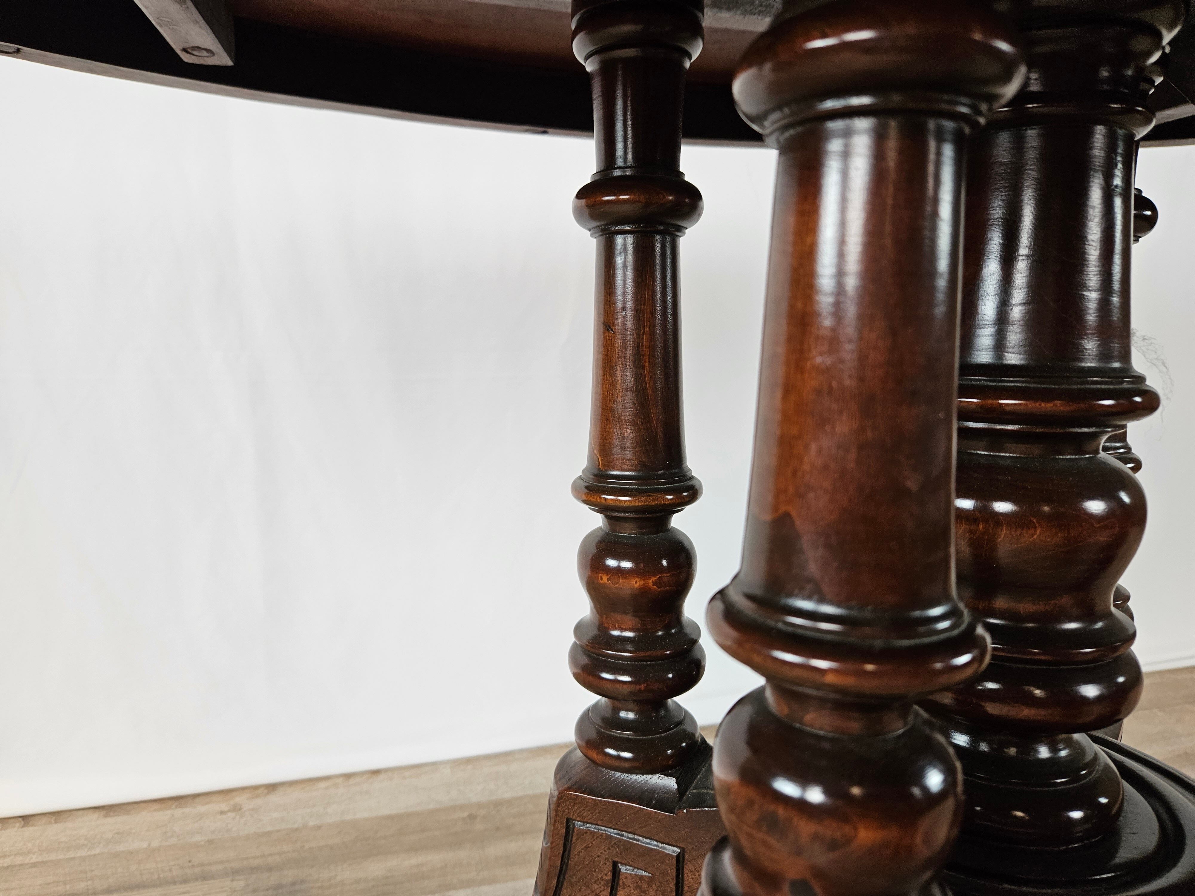 Coffee table in walnut with maple inlays and wheels
