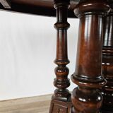 Coffee table in walnut with maple inlays and wheels