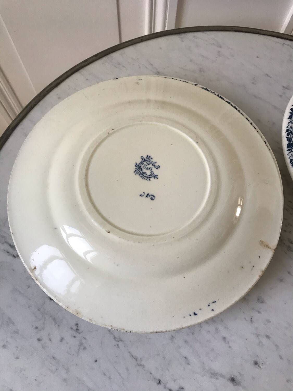Set of 4 flat plates in Terre de Fer, Rocaille model, 19th century