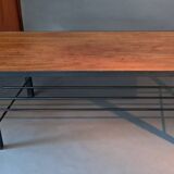 Vintage modernist coffee table in teak and black metal.