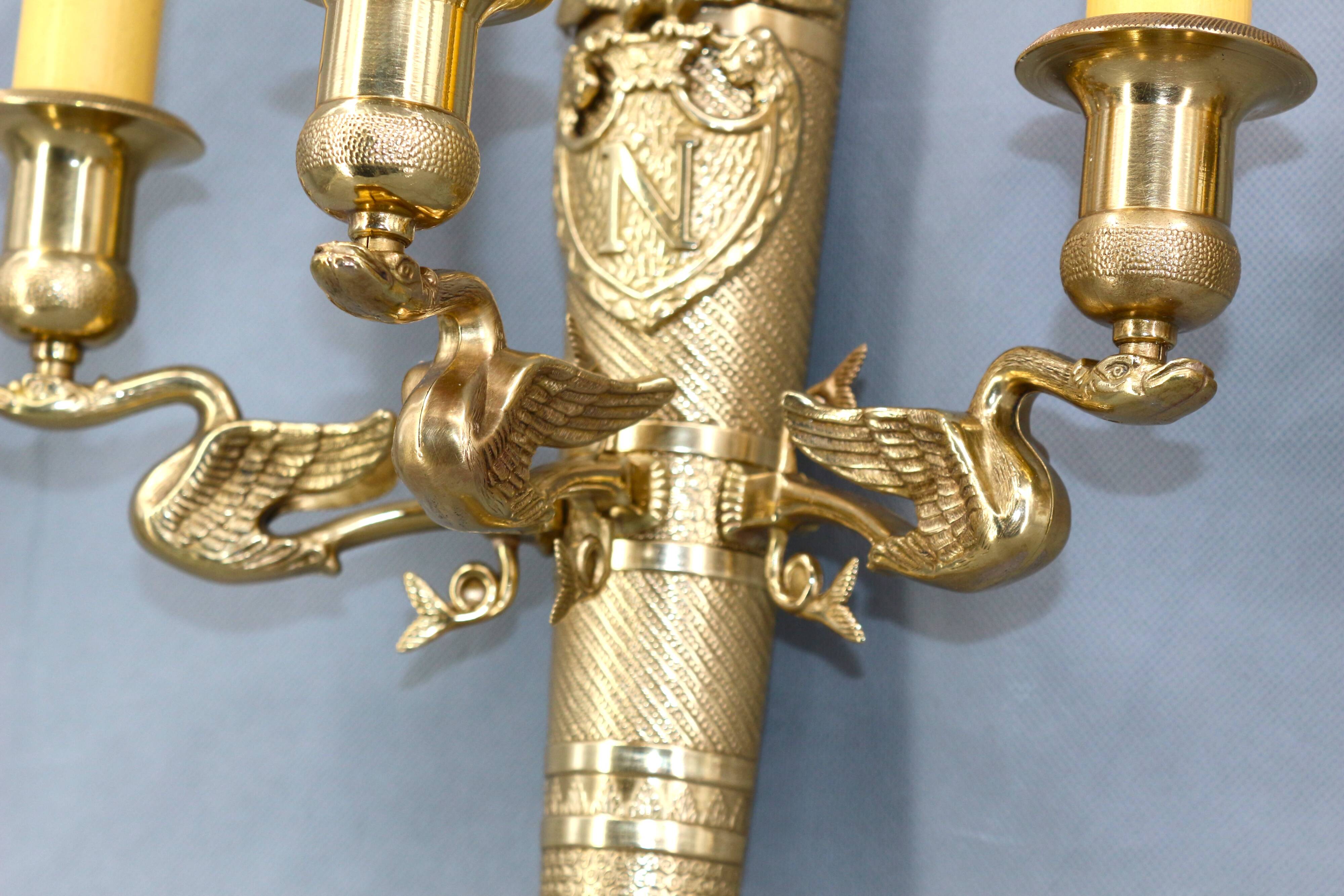Large pair of Napoleonic gilt bronze empire style wall lights with three candles