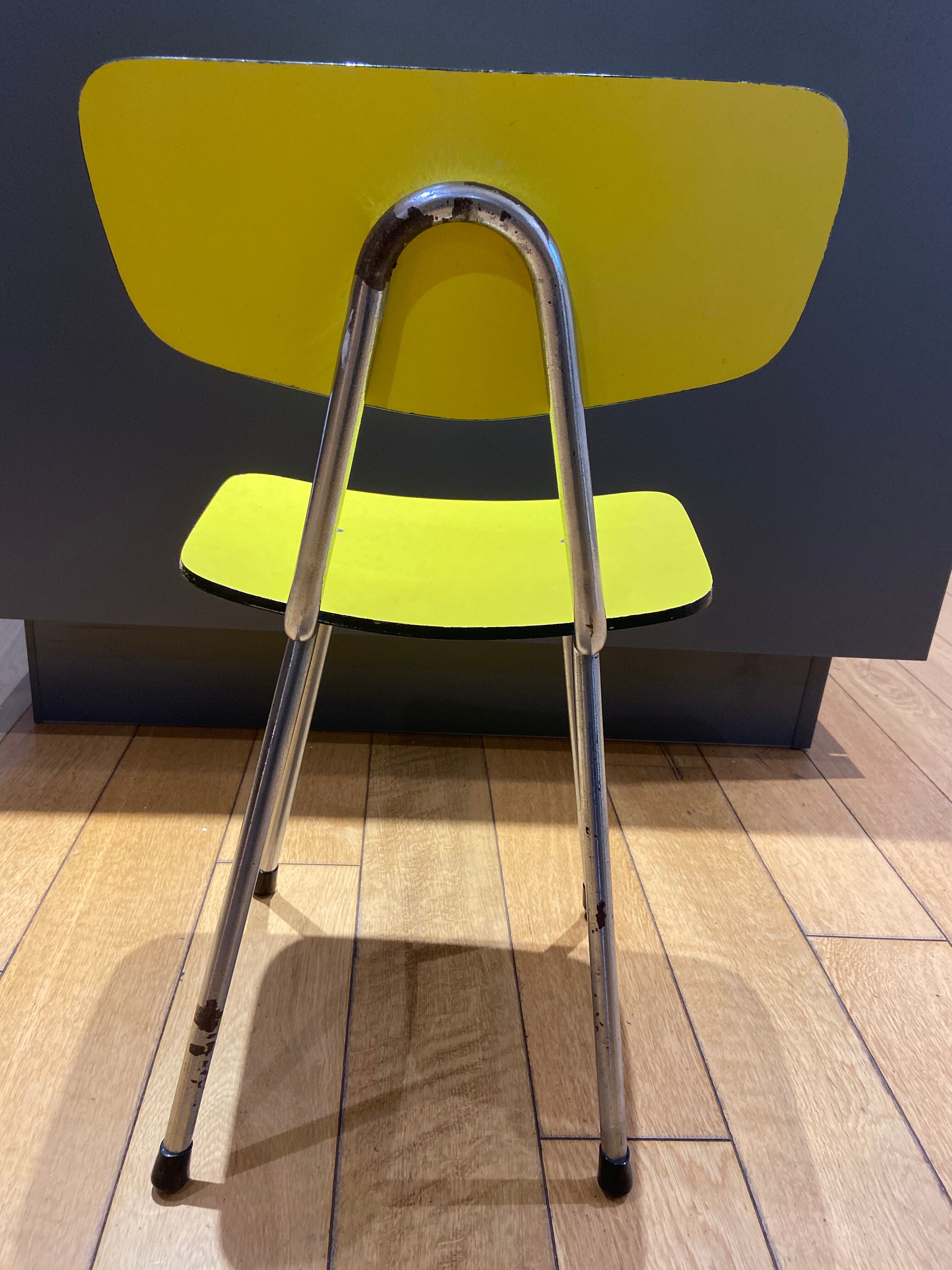 Yellow chair in child formica