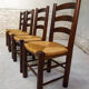 Series of 4 wooden chairs and straw