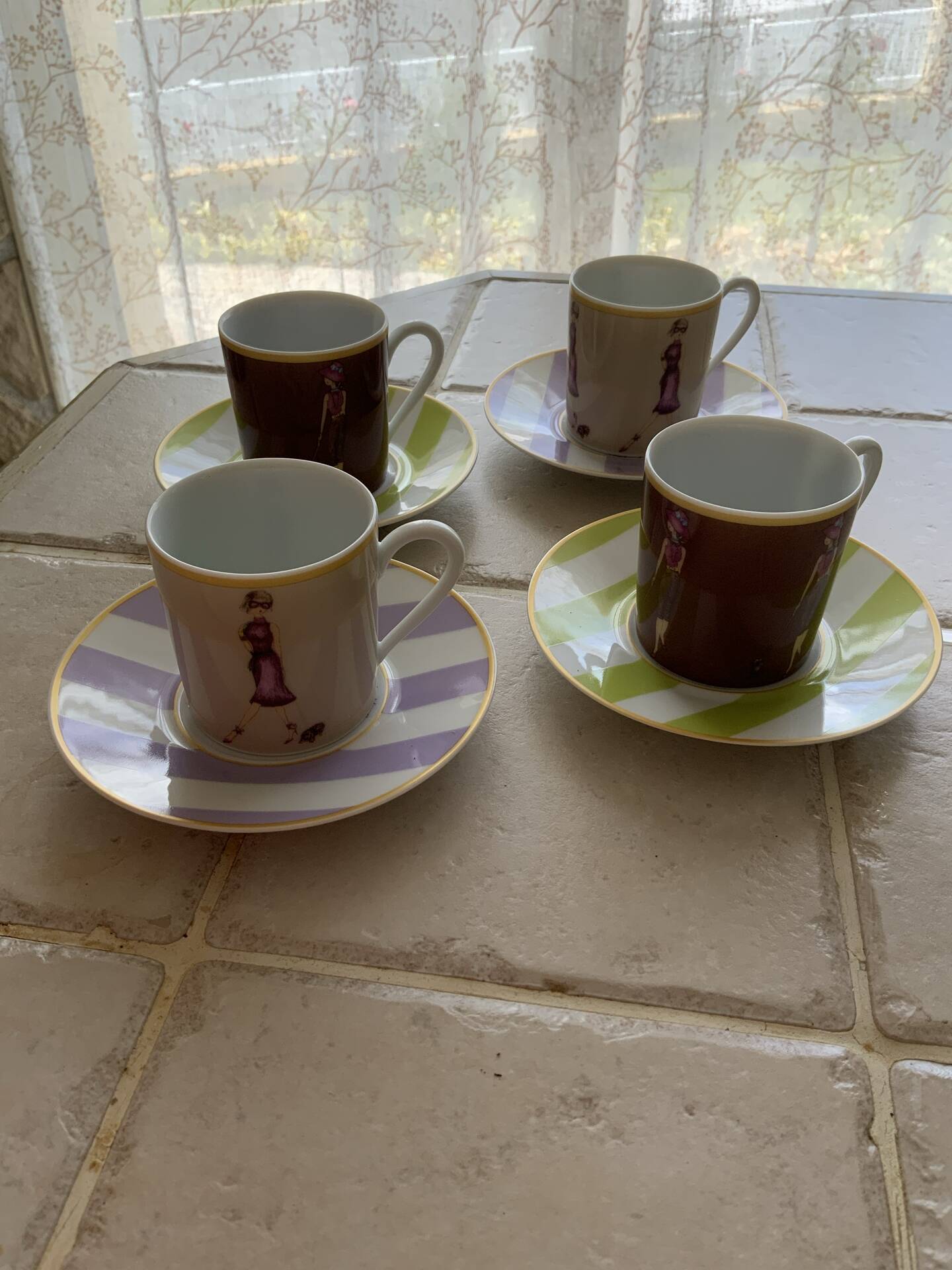 4 cups and saucers porcelain Menard de Noblat - shopping series