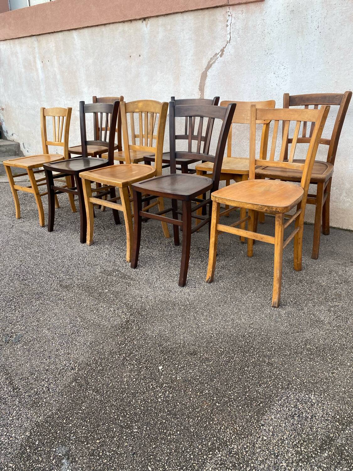 Set of 10 mismatched bistro chairs