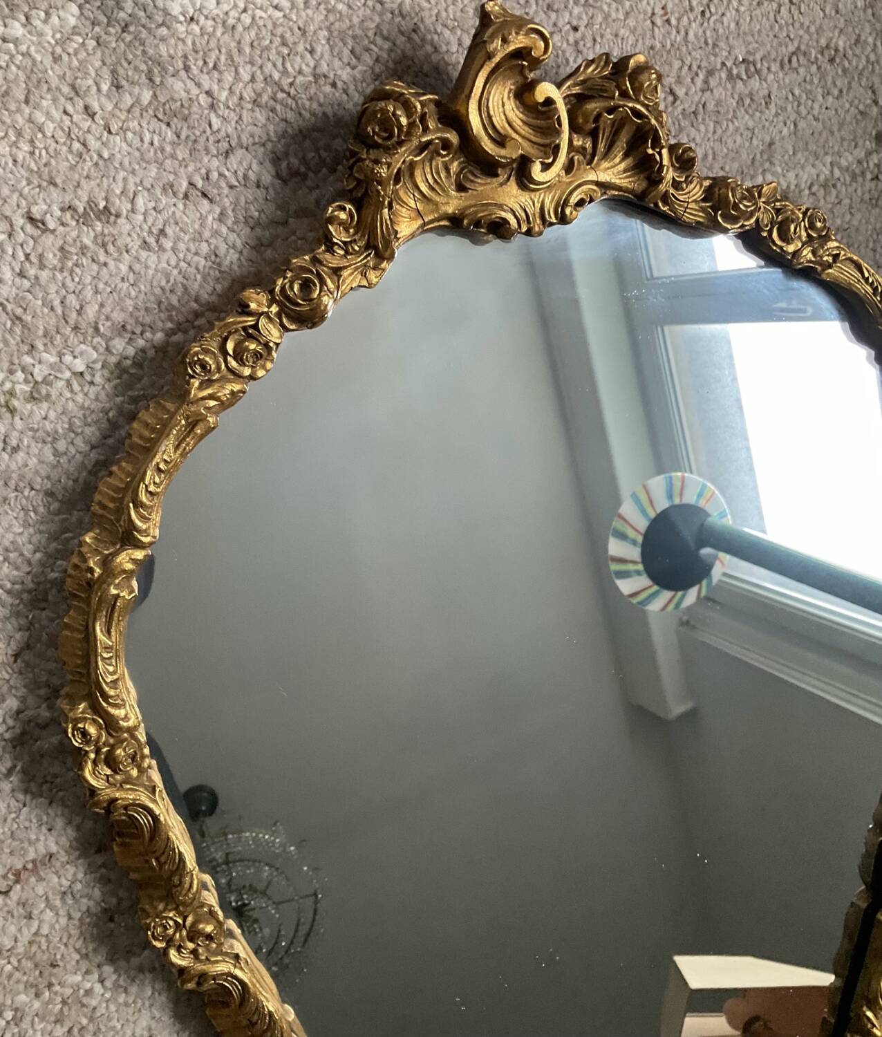 Miroir ancien en bois doré