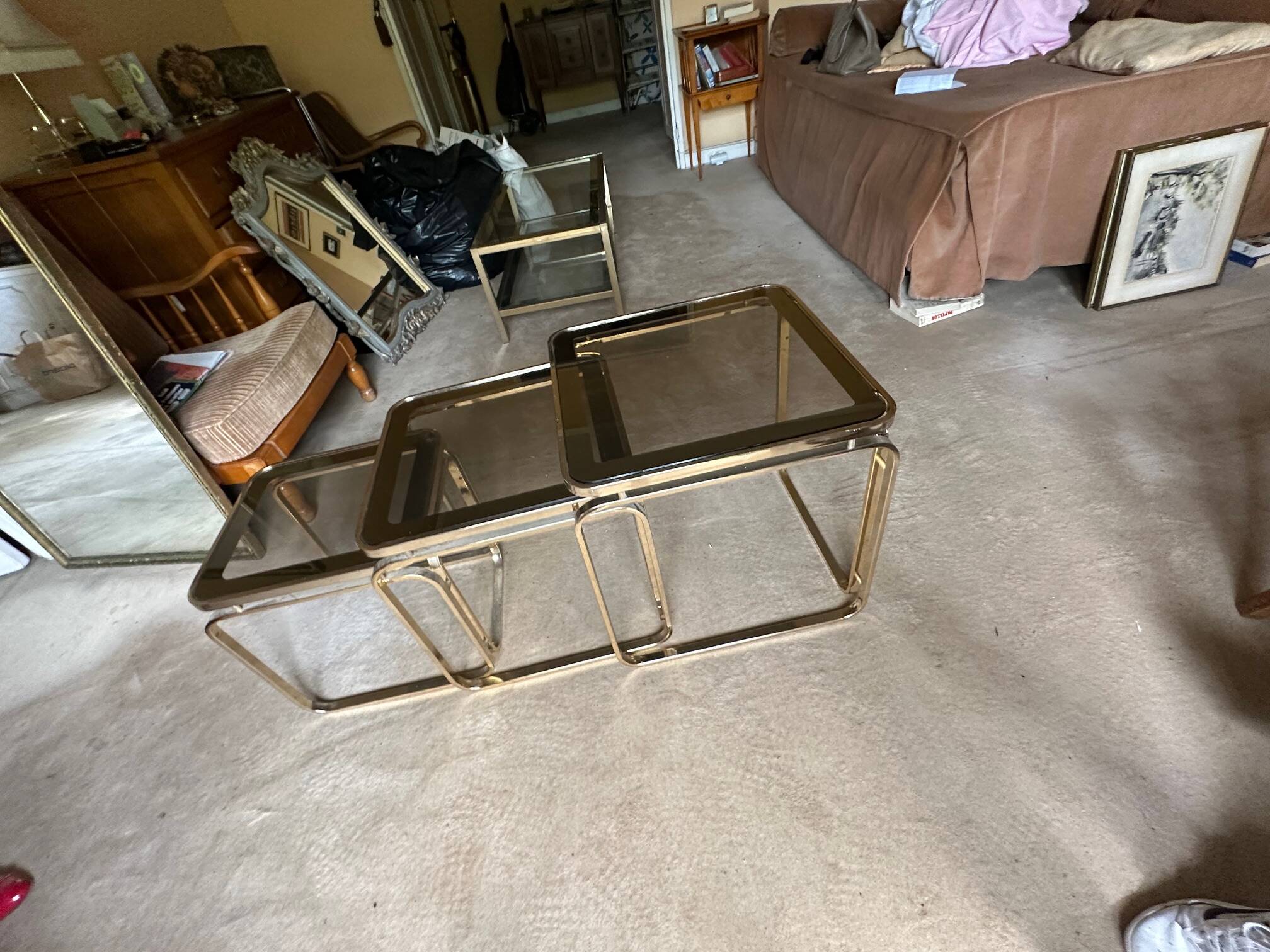 Brass nesting tables with smoked glass tops
