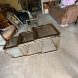 Brass nesting tables with smoked glass tops