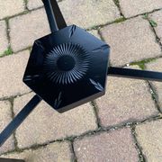 Hand painted black hexagon shaped occasional table.