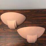 Pair of terracotta wall lights.