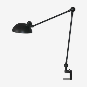 Industrial lamp of old workshop articulated with 2 metal arms