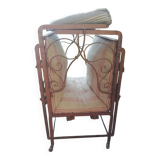 Old wrought iron folding bed