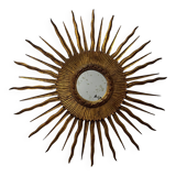 Sun Mirror called Witch's Mirror in gilded wood from the 20s