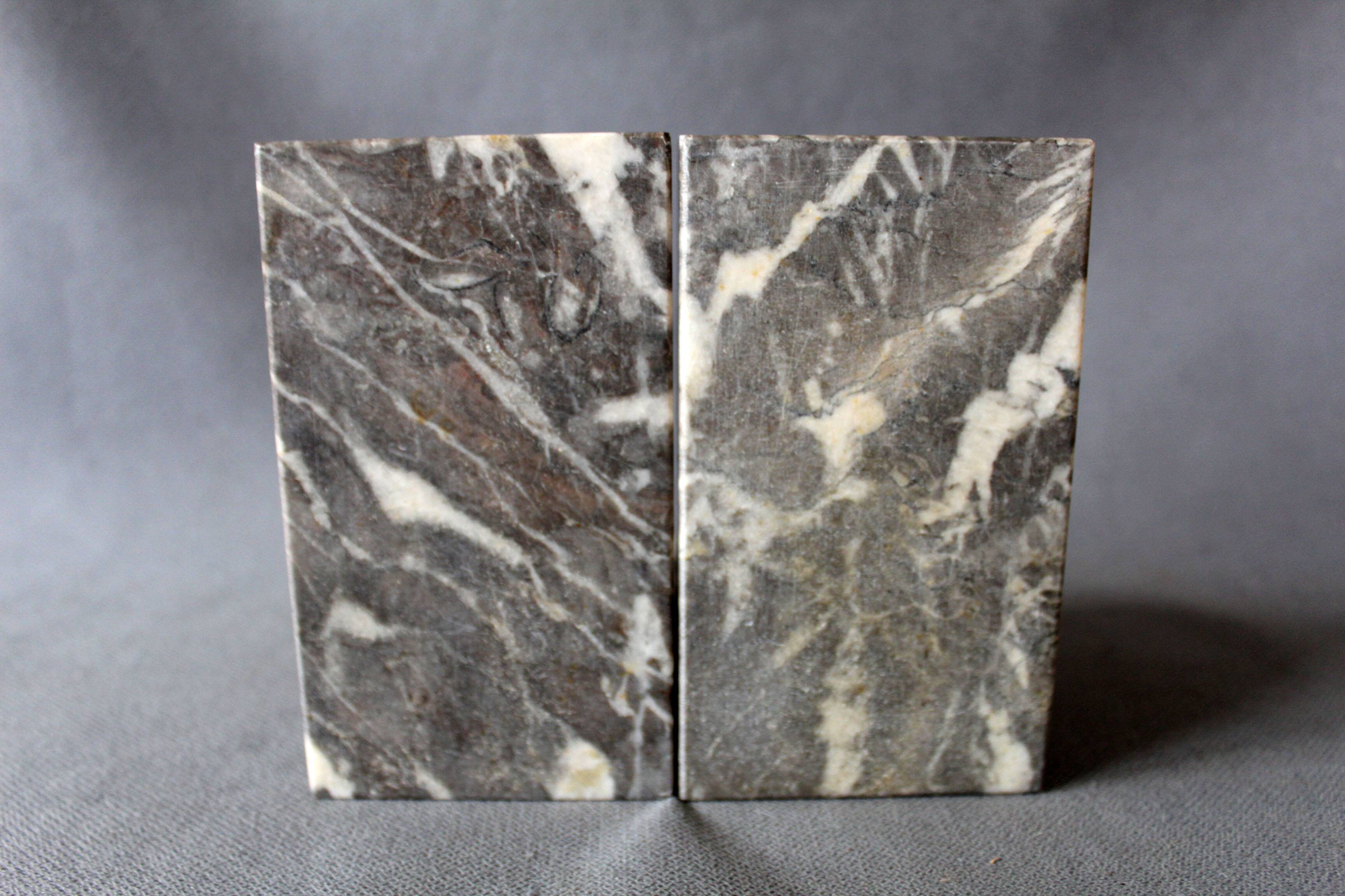 Set of 2 vintage Art Deco bookends in grey, black, and white marble