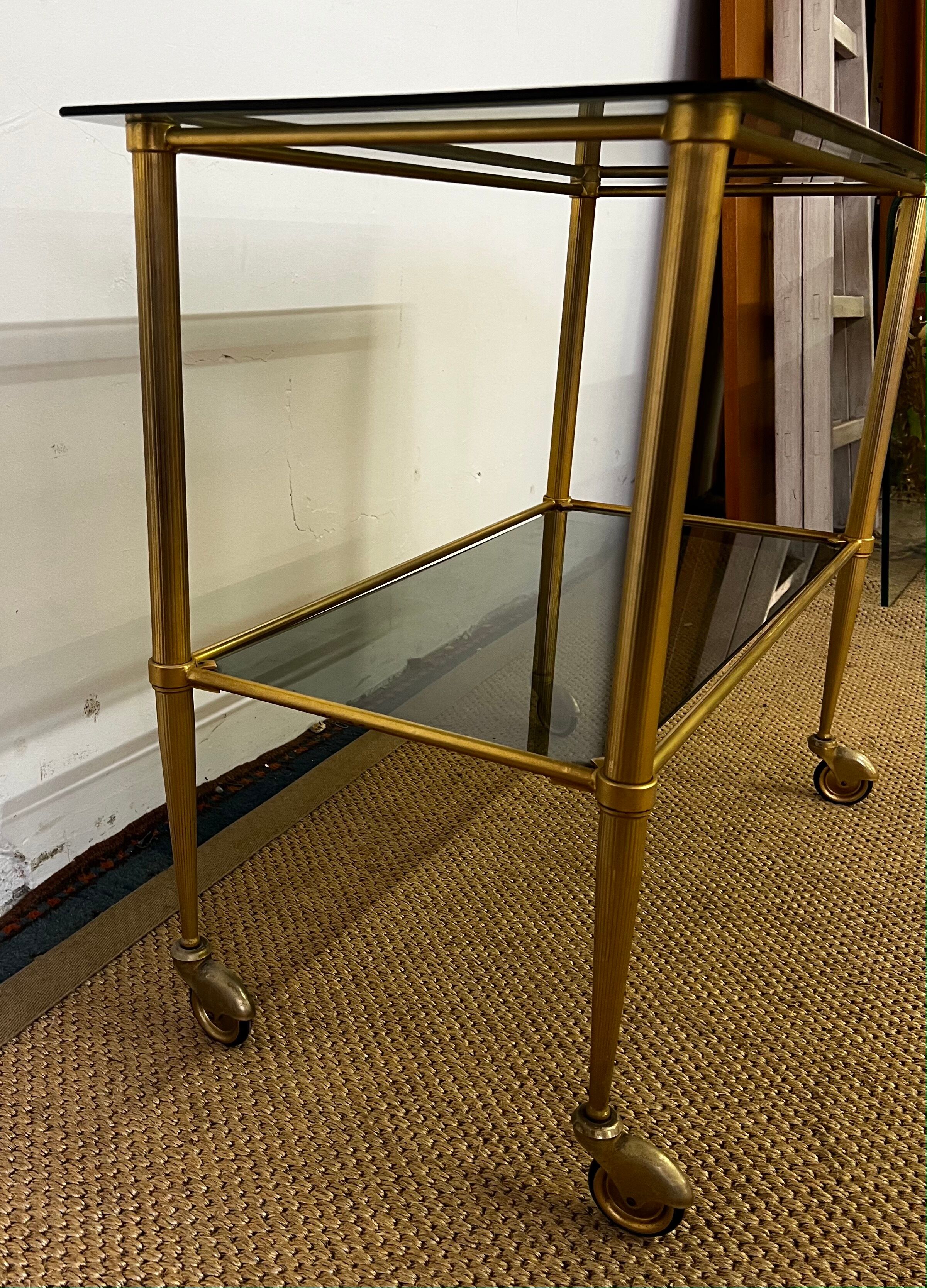 Console / desserte en laiton et verre fumé
