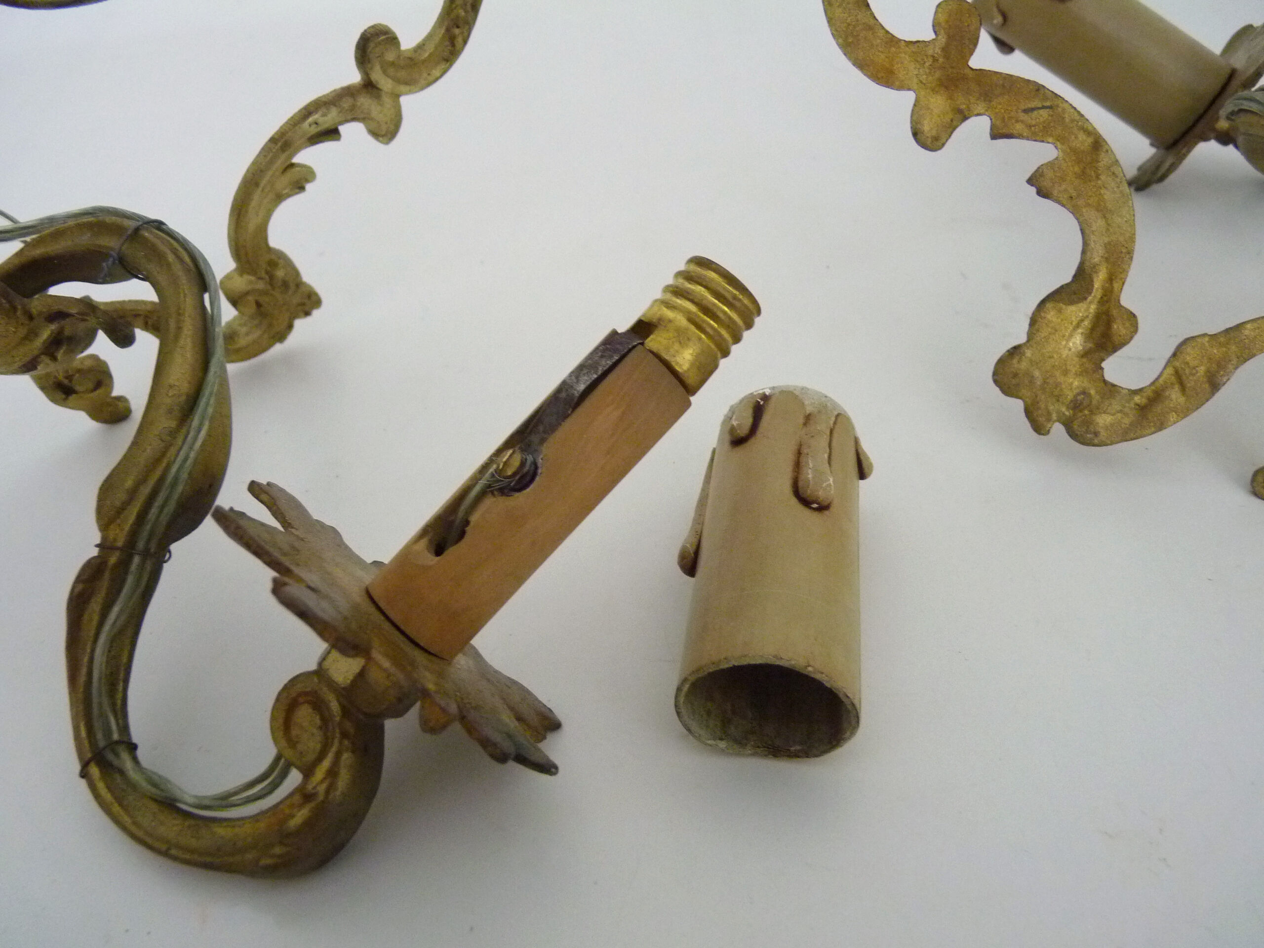 Vintage pair of bronze wall sconces from the 1950s and 60s.