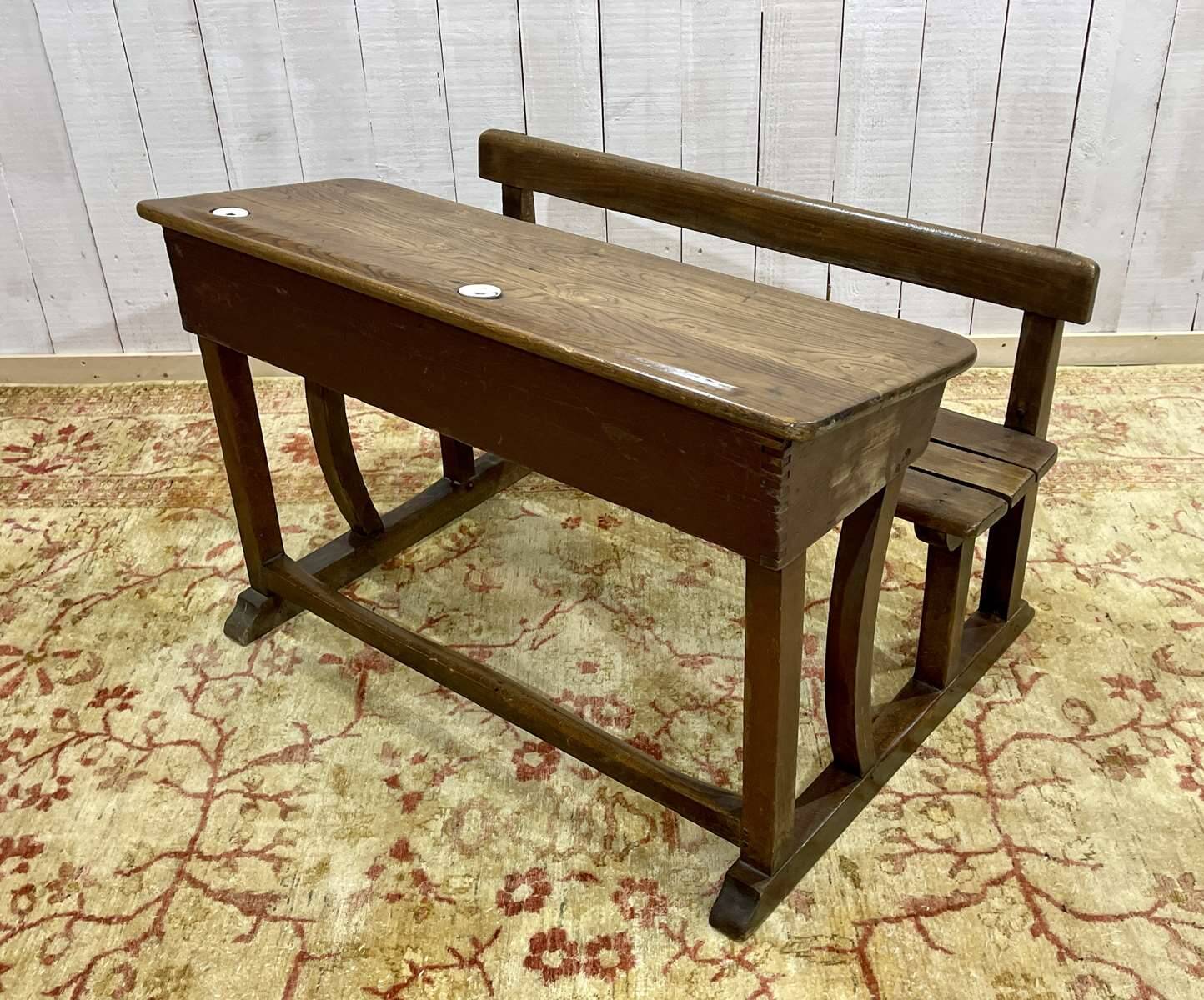Early 20th-century oak school desk with porcelain inkwells
