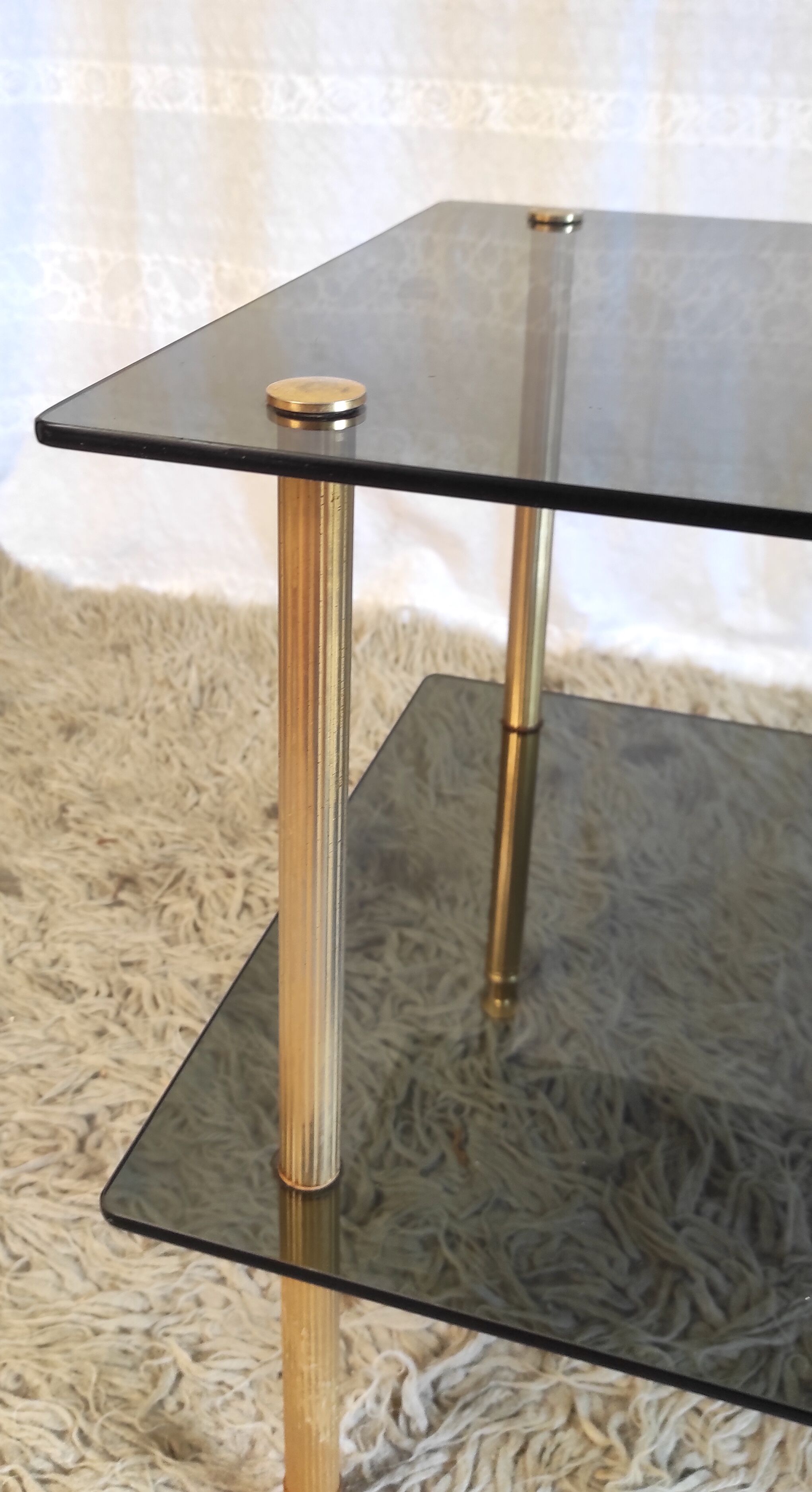 Coffee table in gilded metal and smoked glass – 60s