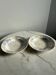 Set of 2 deep plates with floral decoration.
